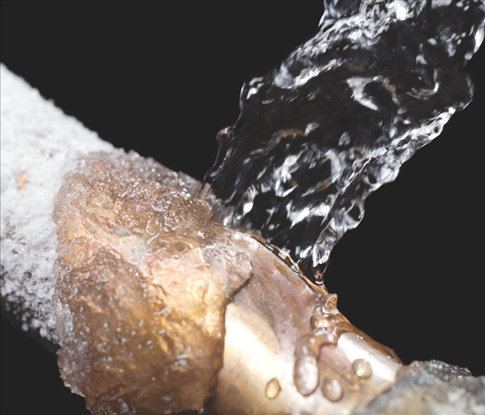 A pipe leaking with freeze damage